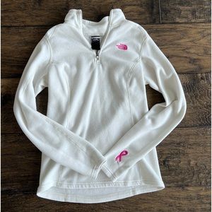 The North Face Women’s Small Quarter Zip with pink lettering